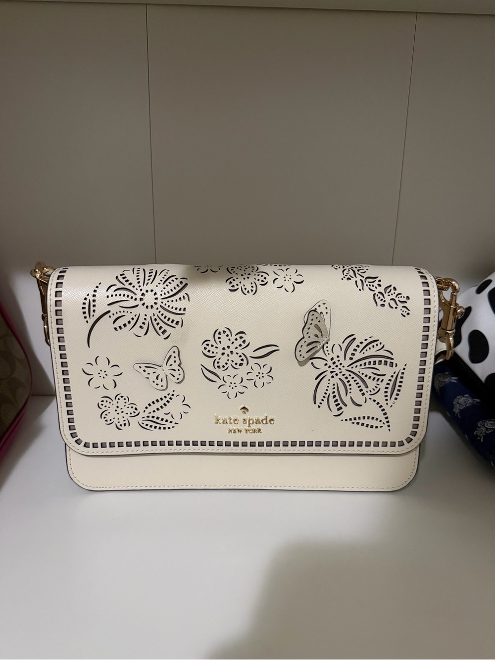 kate spade cream floral & butterfly cutout crossbody